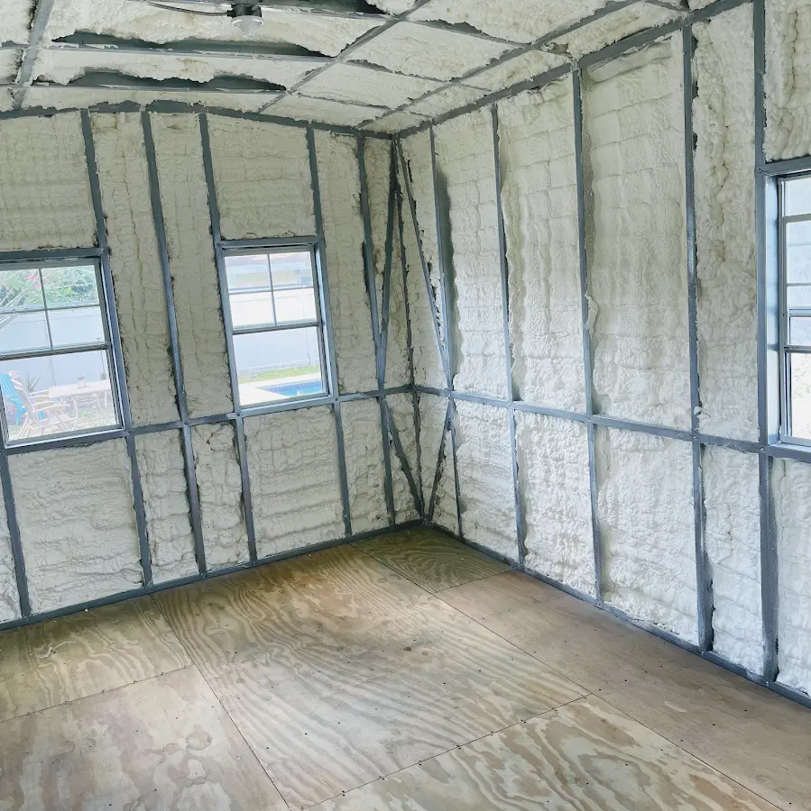 Closed-cell spray foam insulation applied to wall cavities in a residential project in Eagle Mountain